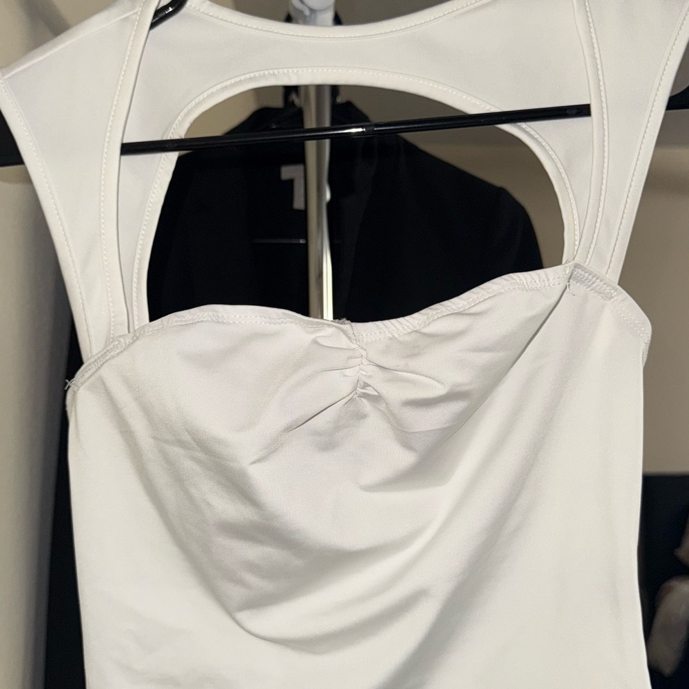 White Sleeveless Top with Cutout Design